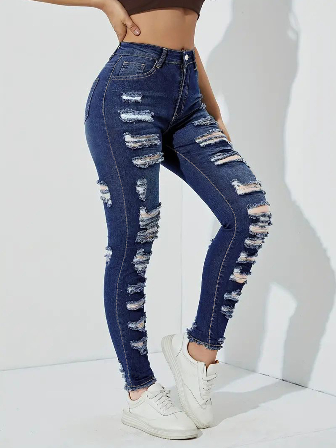 High Waist Distressed Skinny Jeans with Heavily Ripped Design